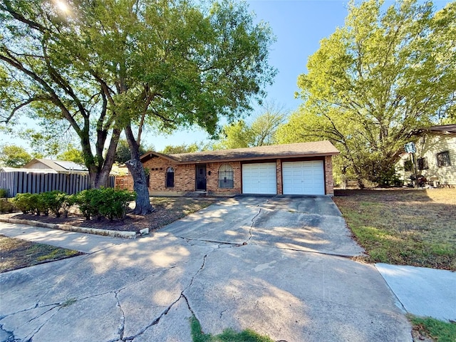 single story home featuring a garage