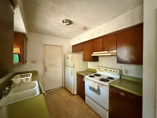 4710 Craigwood Dr, Austin, TX 78725 - kitchen featuring white appliances, under cabinet range hood, a textured ceiling, and brown cabinets