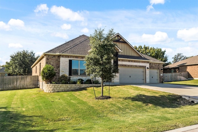 craftsman-style home featuring a front lawn and a garage