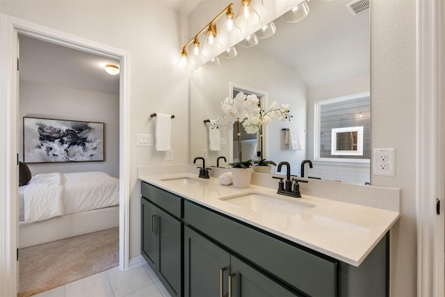 bathroom featuring tile patterned floors and vanity