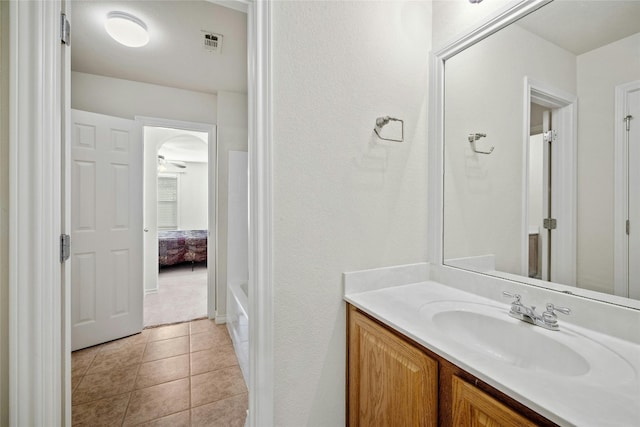 2603 White Stallion Way, Leander, TX 78641 - full bathroom featuring vanity, a tub, and tile patterned floors