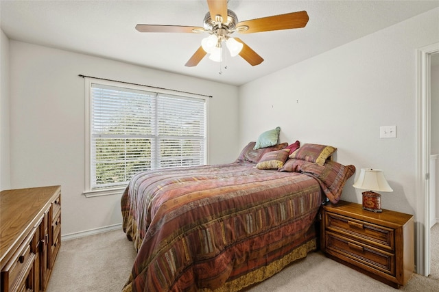 2603 White Stallion Way, Leander, TX 78641 - bedroom with light colored carpet and a ceiling fan