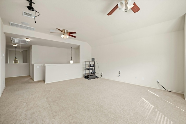 2603 White Stallion Way, Leander, TX 78641 - unfurnished living room featuring a ceiling fan, attic access, and carpet flooring