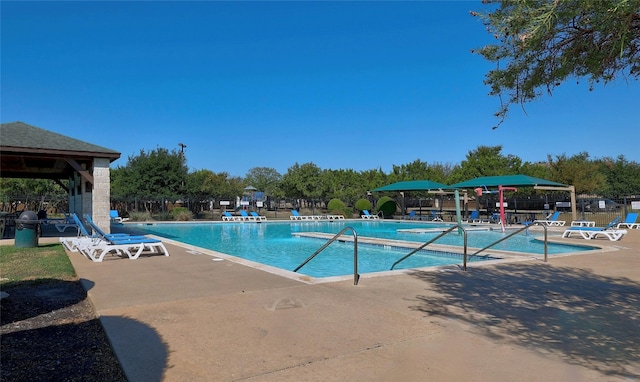 2603 White Stallion Way, Leander, TX 78641 - community pool with a patio area and a gazebo