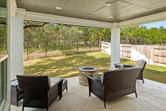 view of patio / terrace with a fire pit