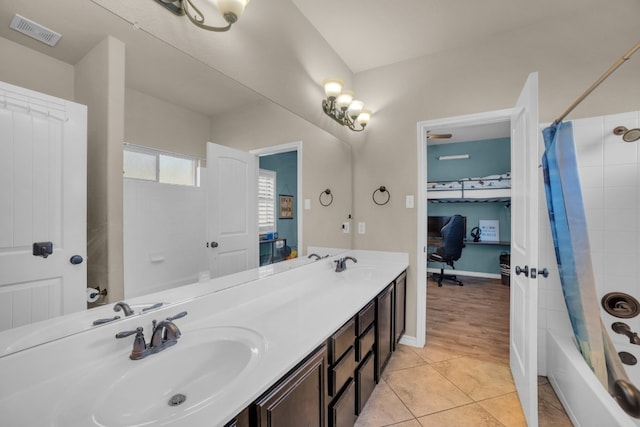 bathroom featuring tile patterned floors, vanity, and shower / tub combo with curtain