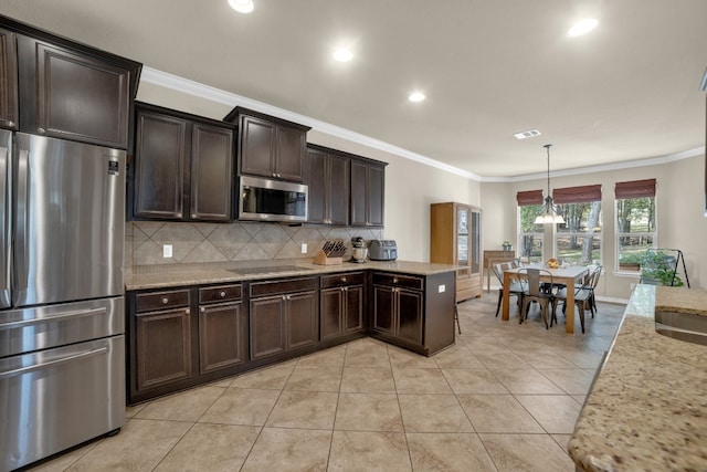 kitchen featuring appliances with stainless steel finishes, tasteful backsplash, ornamental molding, dark brown cabinetry, and decorative light fixtures