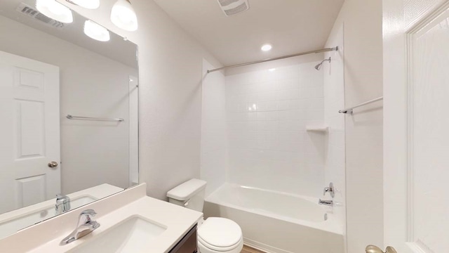 full bathroom with vanity, tub / shower combination, and toilet