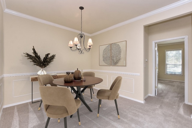 carpeted dining area featuring crown molding and an inviting chandelier