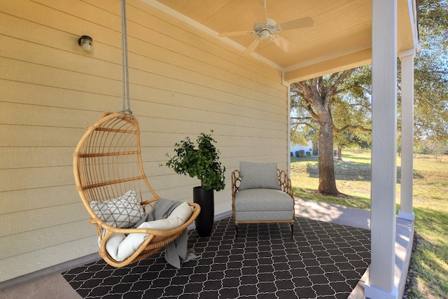 view of patio featuring ceiling fan