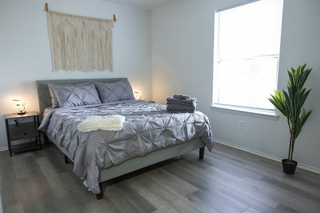 bedroom featuring dark hardwood / wood-style floors