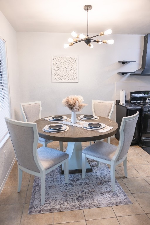 tiled dining area featuring a chandelier