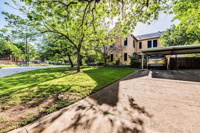 view of yard featuring a carport