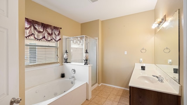 bathroom with tile patterned flooring, vanity, and independent shower and bath