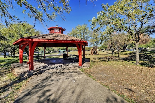 view of home's community with a gazebo and a yard