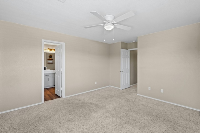 unfurnished bedroom featuring connected bathroom, ceiling fan, and carpet