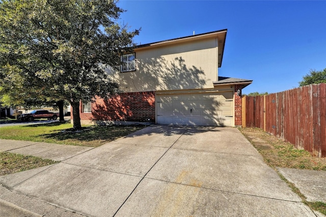 view of side of property featuring a garage