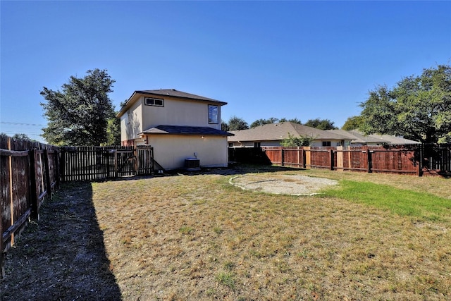 view of yard featuring central AC