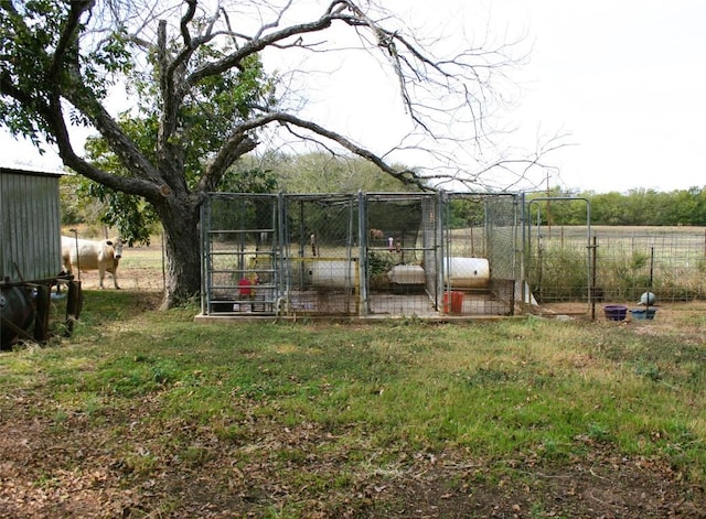 181 N Main St, Paige, TX 78659 - view of yard with an outbuilding