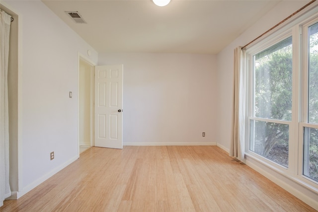 empty room featuring light hardwood / wood-style floors