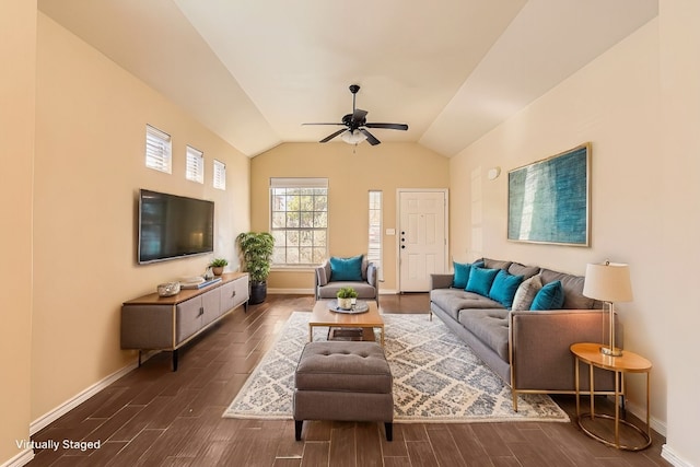 living room featuring dark hardwood / wood-style flooring, ceiling fan, and lofted ceiling