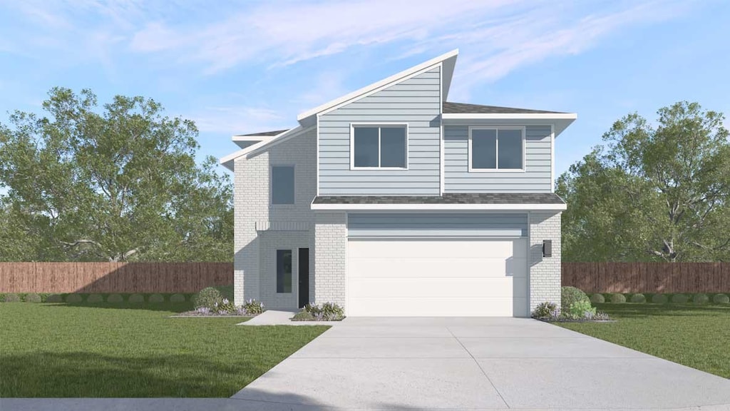 view of front of property featuring a front yard and a garage