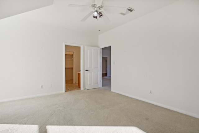 empty room with light carpet and ceiling fan