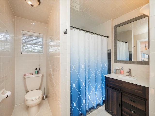 bathroom with walk in shower, vanity, tile walls, tile patterned flooring, and toilet