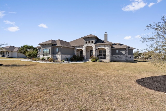 view of front facade featuring a front yard