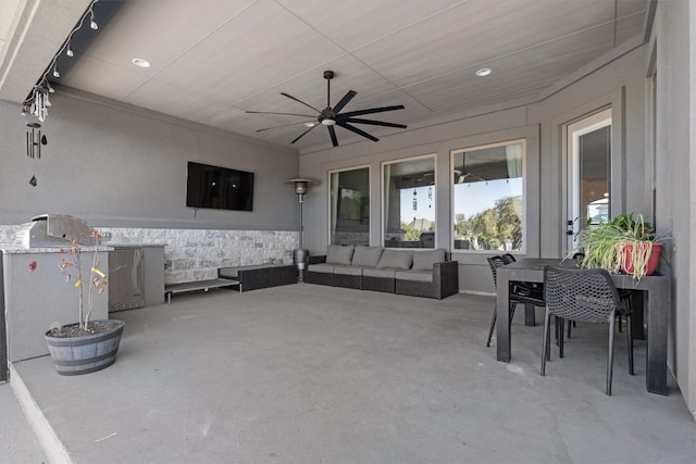 view of patio with ceiling fan