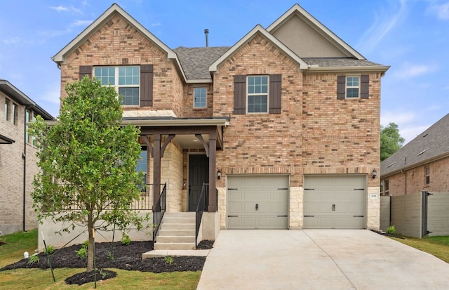 view of front of home with brick siding, a garage, driveway, and a shingled roof