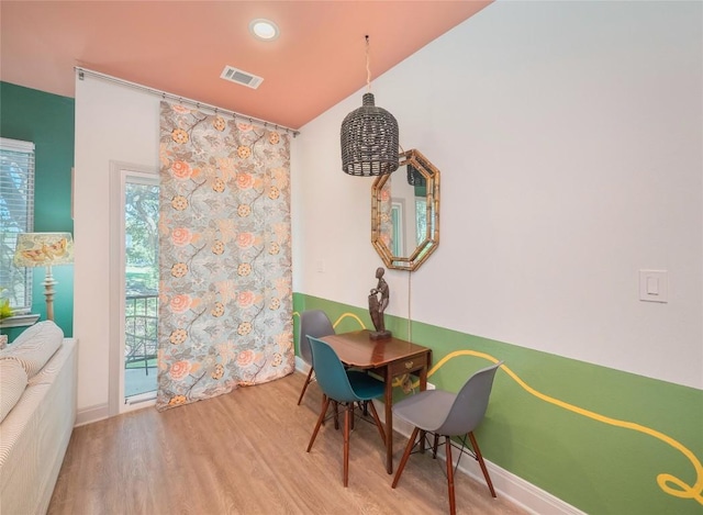 18802 Nicklaus Dr, Lago Vista, TX 78645 - dining space featuring baseboards, wood finished floors, and recessed lighting