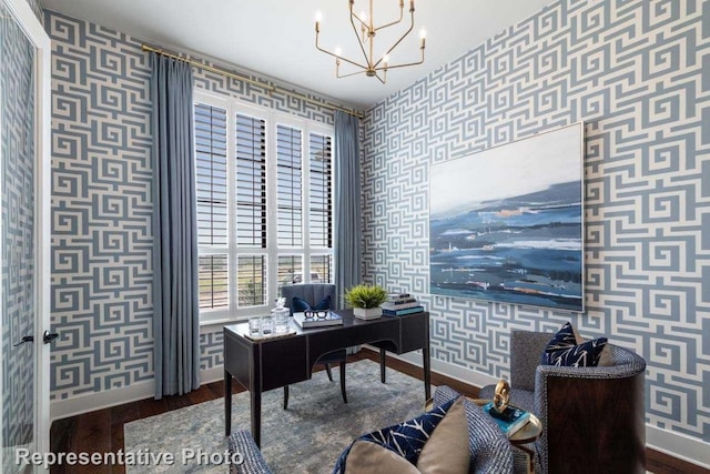 office area with a notable chandelier and dark hardwood / wood-style flooring