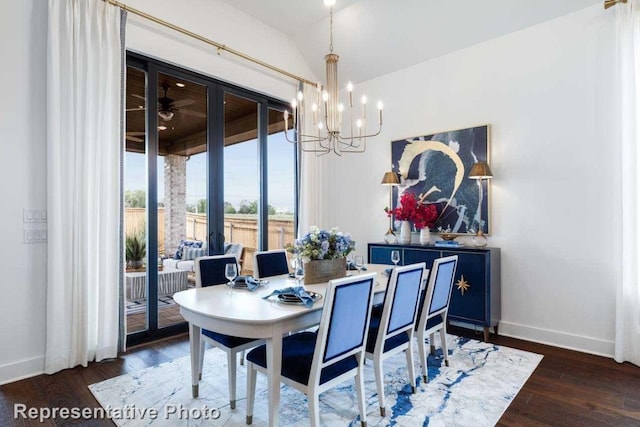 dining space featuring an inviting chandelier, dark hardwood / wood-style flooring, and vaulted ceiling