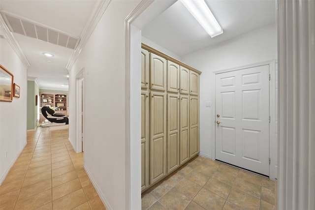 corridor featuring light tile patterned flooring and ornamental molding