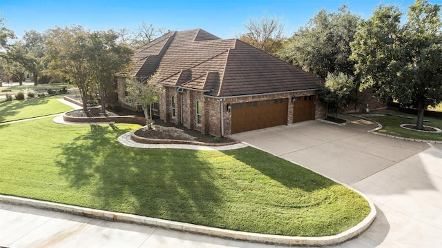 view of side of home with a yard and a garage