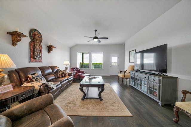 living room with lofted ceiling, ceiling fan, and dark hardwood / wood-style floors