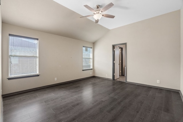 unfurnished room with ceiling fan, dark hardwood / wood-style flooring, and vaulted ceiling