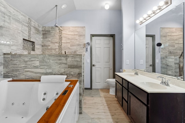 full bathroom featuring vanity, tile walls, hardwood / wood-style floors, toilet, and lofted ceiling