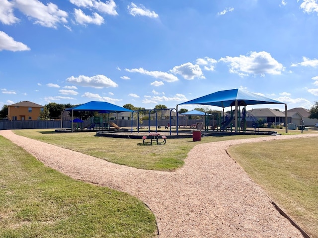 view of playground with a yard