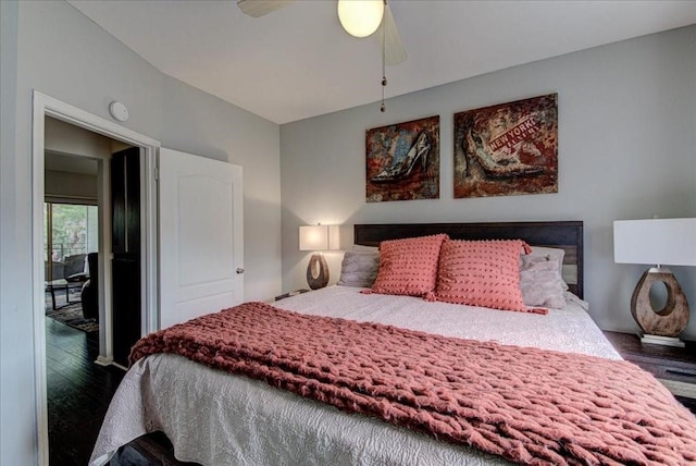 bedroom featuring hardwood / wood-style flooring and ceiling fan