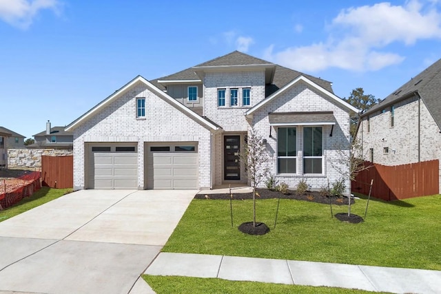 1424 Cardinal Ln, Round Rock, TX 78681 - view of front of house featuring driveway, an attached garage, brick siding, and a shingled roof