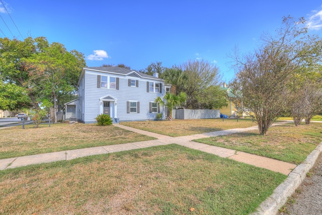 view of front facade with a front lawn