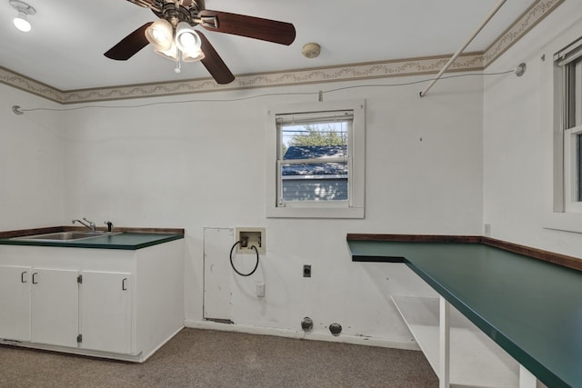 laundry area with ceiling fan, sink, electric dryer hookup, hookup for a washing machine, and light carpet