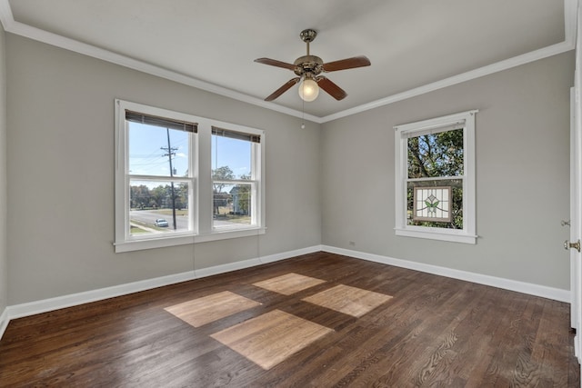 unfurnished room featuring ornamental molding, plenty of natural light, and dark wood-type flooring