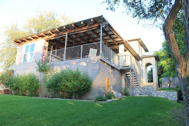 view of home's exterior with a yard