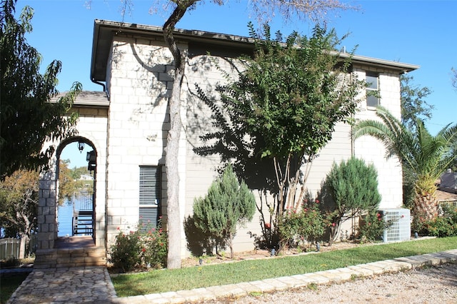 view of front of house featuring central AC unit