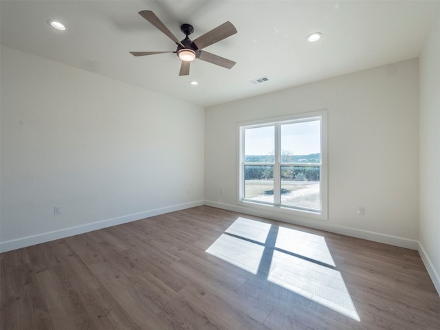 unfurnished room with light hardwood / wood-style floors and ceiling fan