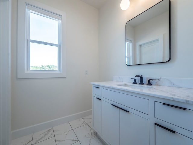 bathroom featuring vanity and a healthy amount of sunlight