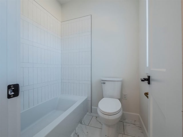 bathroom with a bathtub and toilet